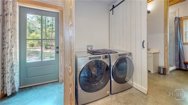 26 Cason Dr, Pembroke, GA 31321 - laundry room with washer and dryer and a barn door