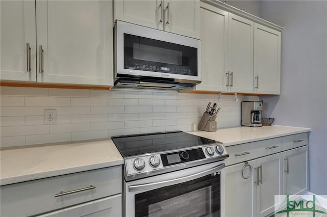 206 Park Chase Chase, Pooler, GA 31322 - kitchen featuring electric range, backsplash, and gray cabinets