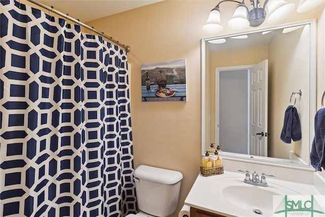 full bathroom with toilet, vanity, and a shower with curtain