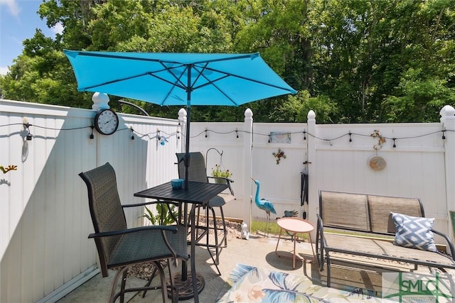 view of patio / terrace with fence