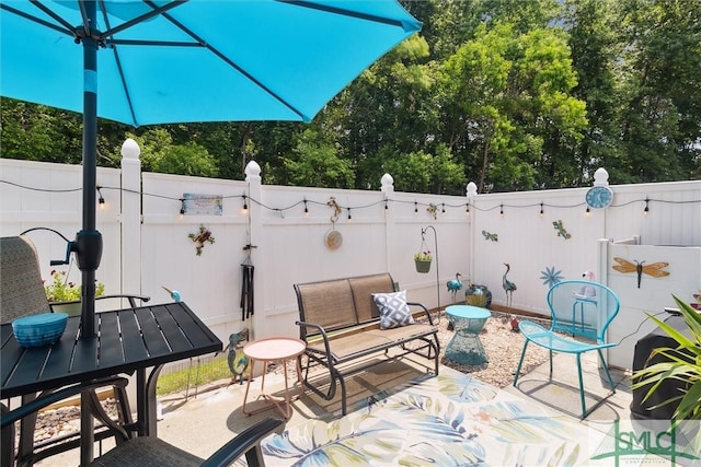 view of patio / terrace with fence and outdoor dining area
