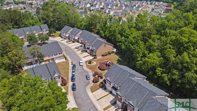 aerial view of property's location with nearby suburban area