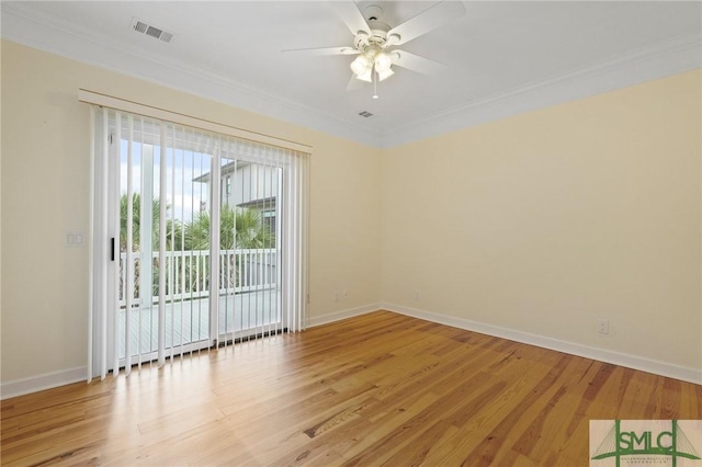 15 Teresa Ln, Tybee Island, GA 31328 - spare room with crown molding, ceiling fan, baseboards, and light wood-type flooring