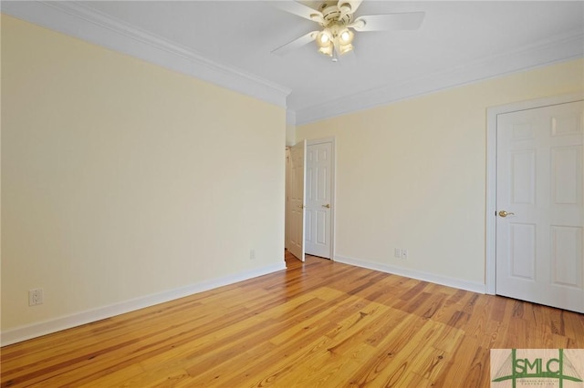 15 Teresa Ln, Tybee Island, GA 31328 - unfurnished room with crown molding, light wood finished floors, a ceiling fan, and baseboards