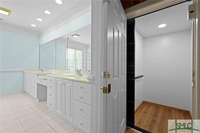 15 Teresa Ln, Tybee Island, GA 31328 - full bath featuring double vanity, baseboards, wood finished floors, ornamental molding, and recessed lighting
