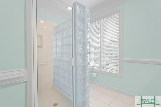 15 Teresa Ln, Tybee Island, GA 31328 - bathroom featuring a stall shower, tile patterned floors, and baseboards