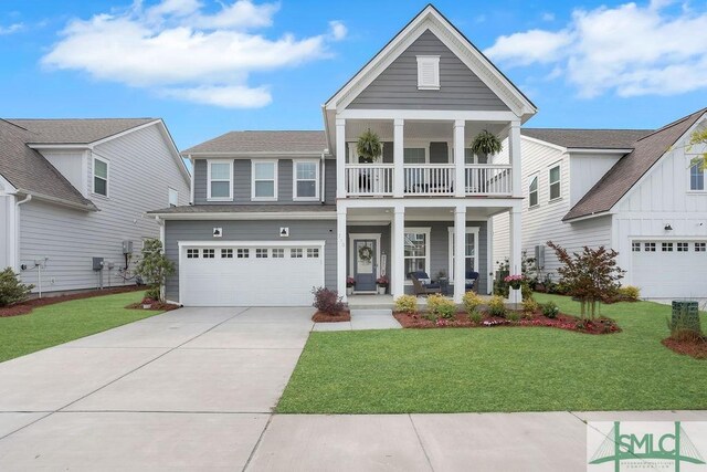 710 Longleaf Dr, Richmond Hill, GA 31324 - greek revival house featuring covered porch, a balcony, driveway, and a front lawn