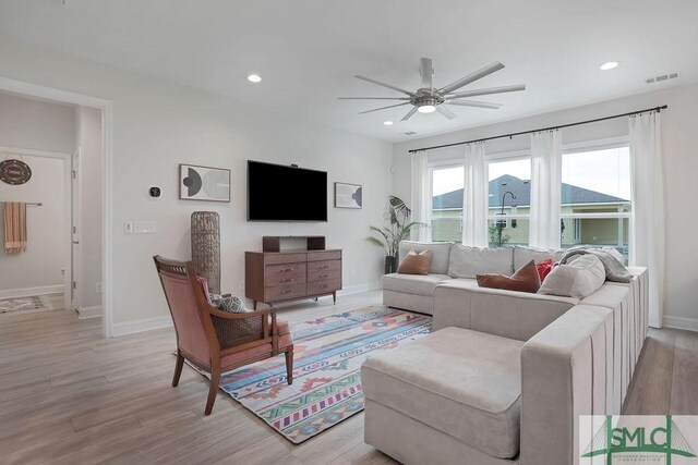 710 Longleaf Dr, Richmond Hill, GA 31324 - living room with ceiling fan, baseboards, light wood-type flooring, and recessed lighting