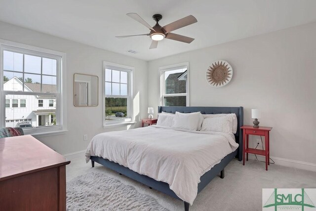 710 Longleaf Dr, Richmond Hill, GA 31324 - bedroom featuring baseboards, light colored carpet, and a ceiling fan