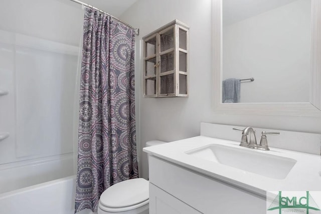710 Longleaf Dr, Richmond Hill, GA 31324 - bathroom with toilet, vanity, and shower / bathtub combination with curtain