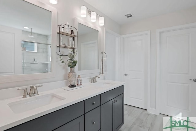 710 Longleaf Dr, Richmond Hill, GA 31324 - bathroom featuring a shower stall and double vanity