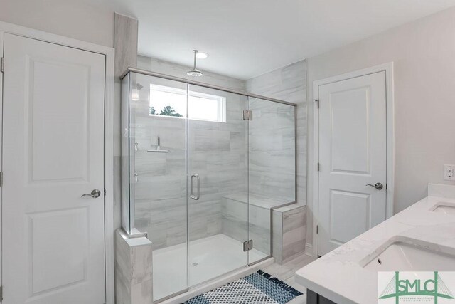 710 Longleaf Dr, Richmond Hill, GA 31324 - full bathroom featuring a shower stall and double vanity