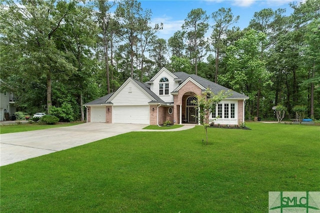 6 Baysprings Pt, Savannah, GA 31405 - view of front facade featuring concrete driveway, brick siding, an attached garage, and a front yard