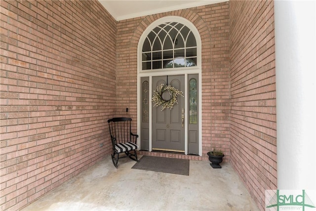 6 Baysprings Pt, Savannah, GA 31405 - doorway to property featuring brick siding and covered porch