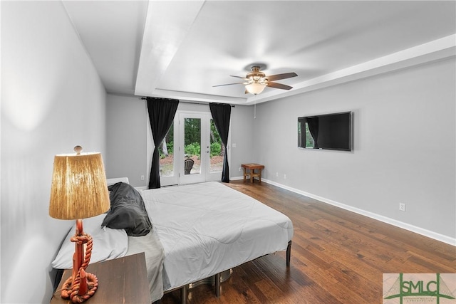 6 Baysprings Pt, Savannah, GA 31405 - bedroom featuring a raised ceiling, french doors, wood finished floors, and baseboards