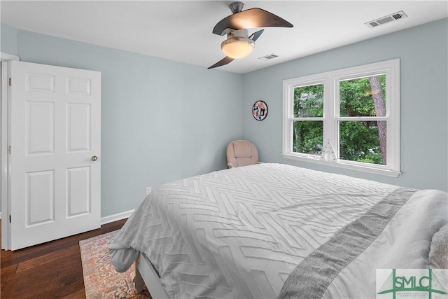 6 Baysprings Pt, Savannah, GA 31405 - bedroom with dark wood-style floors, ceiling fan, and baseboards