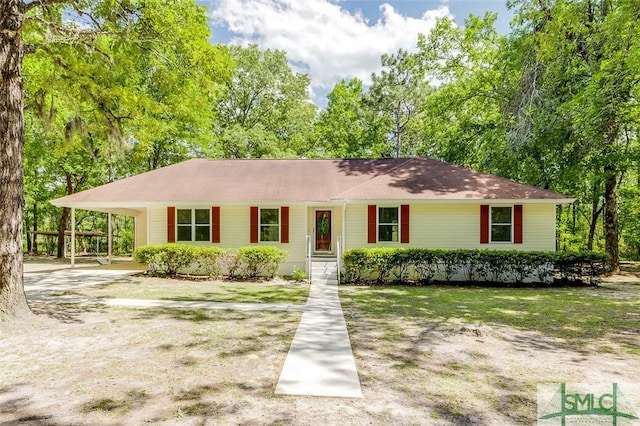 1488 Old Augusta Rd, Clyo, GA 31303 - ranch-style house with an attached carport and driveway