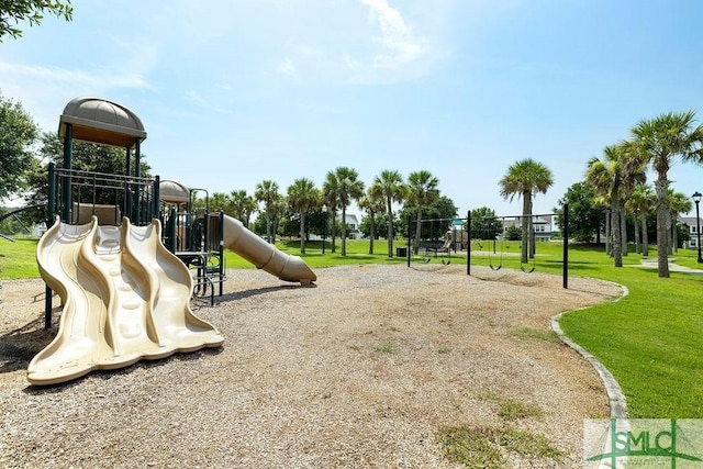 community jungle gym with a yard