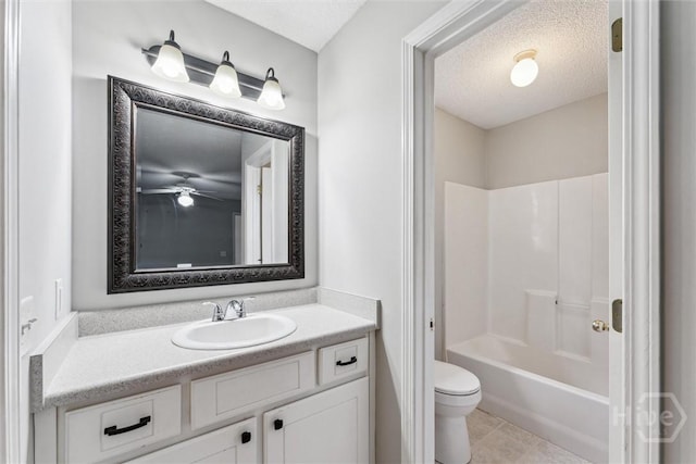 105 Mustang Dr, Guyton, GA 31312 - full bath featuring toilet, vanity, ceiling fan, bathing tub / shower combination, and a textured ceiling