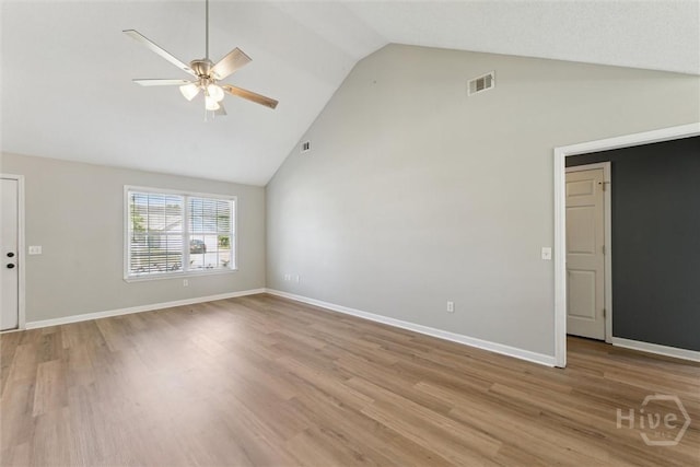 105 Mustang Dr, Guyton, GA 31312 - unfurnished living room with ceiling fan, high vaulted ceiling, wood finished floors, and baseboards