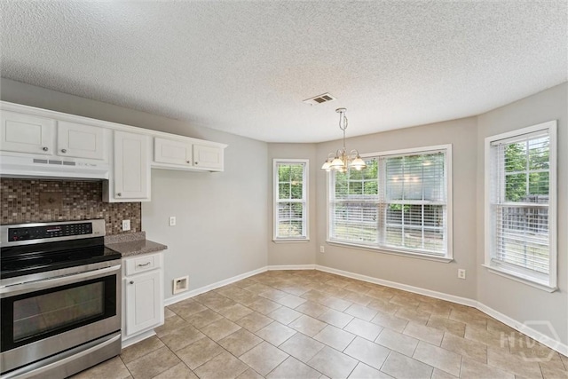 105 Mustang Dr, Guyton, GA 31312 - kitchen featuring electric range, under cabinet range hood, a chandelier, white cabinetry, and backsplash