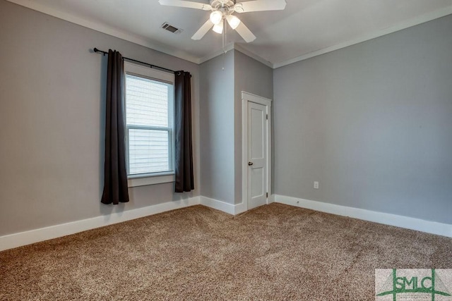 40 Lawton Ave, Savannah, GA 31404 - carpeted empty room with a ceiling fan, baseboards, and ornamental molding