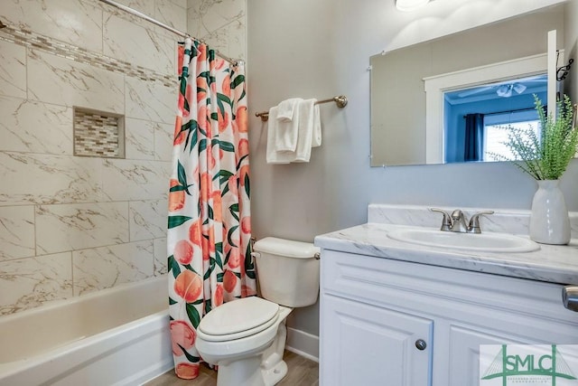 40 Lawton Ave, Savannah, GA 31404 - full bath with toilet, vanity, shower / bath combination with curtain, and wood finished floors
