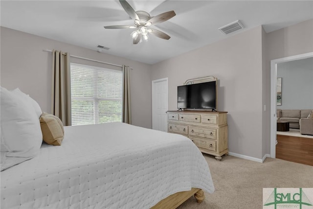 144 Royal Ln, Pooler, GA 31322 - bedroom featuring light carpet, a ceiling fan, and baseboards