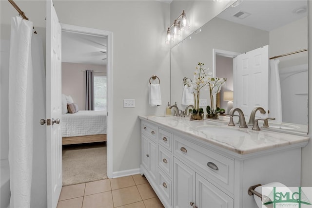 144 Royal Ln, Pooler, GA 31322 - bathroom with tile patterned floors, ensuite bathroom, double vanity, baseboards, and curtained shower