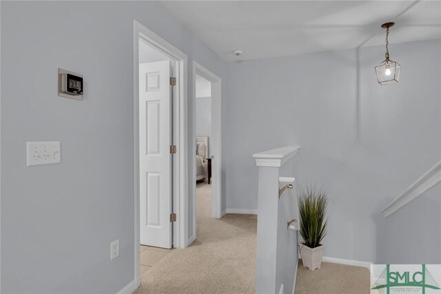 144 Royal Ln, Pooler, GA 31322 - hall featuring an upstairs landing, carpet, and baseboards