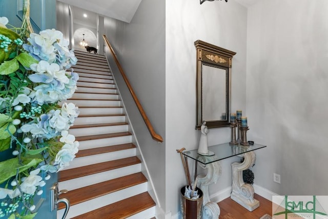 1104 River Oaks Dr Unit 1104, Richmond Hill, GA 31324 - stairs featuring wood finished floors and baseboards