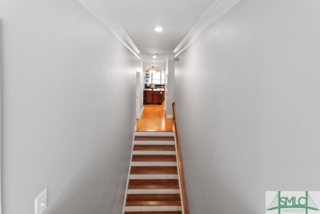 1104 River Oaks Dr Unit 1104, Richmond Hill, GA 31324 - staircase featuring crown molding, arched walkways, and recessed lighting