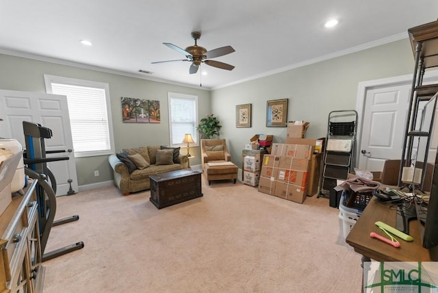 carpeted living area featuring ceiling fan, crown molding, recessed lighting, and baseboards
