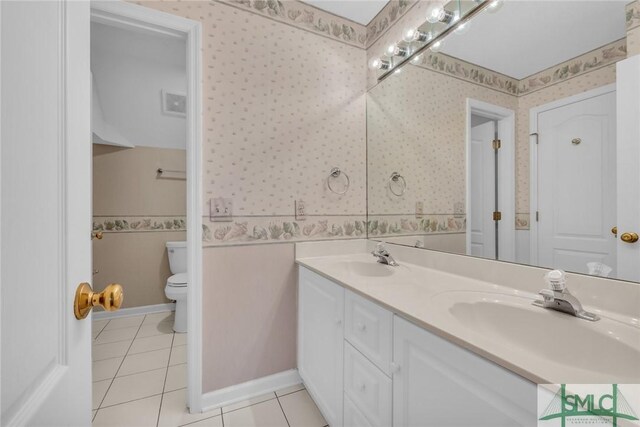 105 Crooked Wood Ln, Savannah, GA 31406 - bathroom featuring wallpapered walls, toilet, tile patterned floors, and double vanity