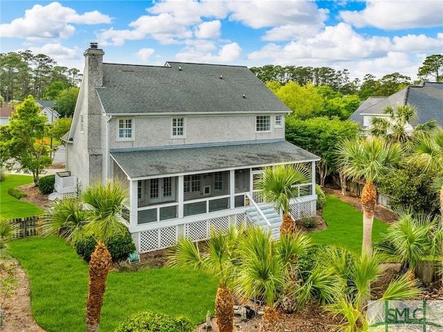 105 Crooked Wood Ln, Savannah, GA 31406 - rear view of house with roof with shingles, a chimney, and stucco siding
