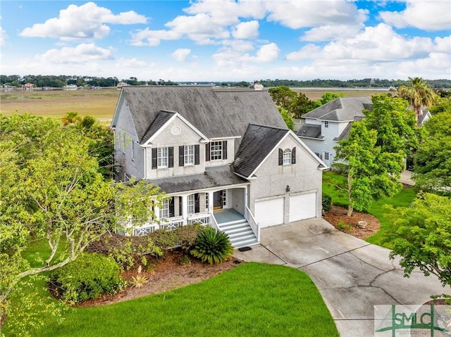 105 Crooked Wood Ln, Savannah, GA 31406 - view of front facade featuring covered porch, concrete driveway, roof with shingles, a garage, and a front lawn