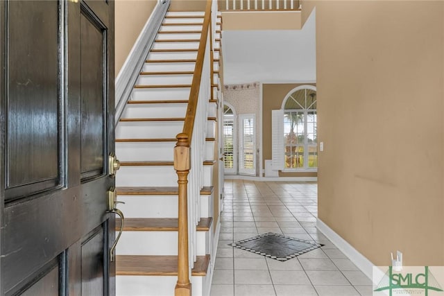 105 Crooked Wood Ln, Savannah, GA 31406 - entrance foyer featuring light tile patterned floors, stairway, and baseboards