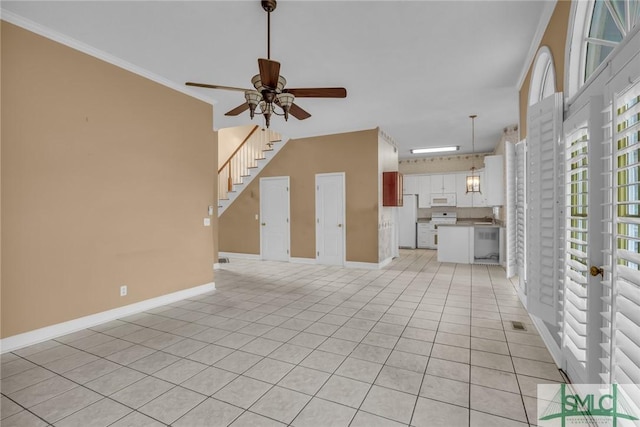 105 Crooked Wood Ln, Savannah, GA 31406 - unfurnished living room with light tile patterned floors, baseboards, a ceiling fan, ornamental molding, and stairway
