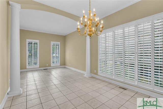 105 Crooked Wood Ln, Savannah, GA 31406 - unfurnished dining area featuring light tile patterned floors, baseboards, a chandelier, and ornate columns