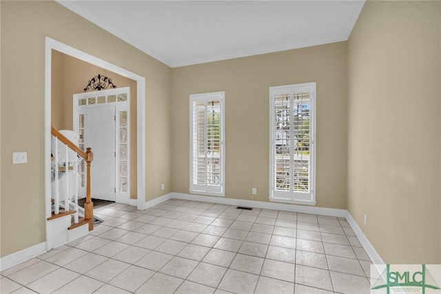105 Crooked Wood Ln, Savannah, GA 31406 - empty room with light tile patterned floors, stairway, baseboards, and ornamental molding