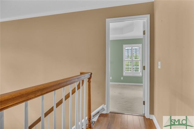 105 Crooked Wood Ln, Savannah, GA 31406 - corridor with baseboards, crown molding, an upstairs landing, and wood finished floors