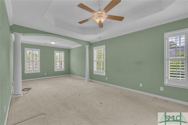 105 Crooked Wood Ln, Savannah, GA 31406 - carpeted spare room featuring decorative columns, a tray ceiling, healthy amount of natural light, baseboards, and crown molding