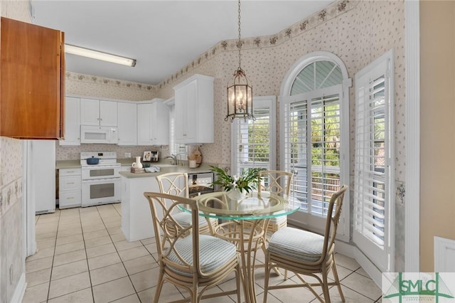 105 Crooked Wood Ln, Savannah, GA 31406 - dining area featuring wallpapered walls, light tile patterned flooring, and a chandelier
