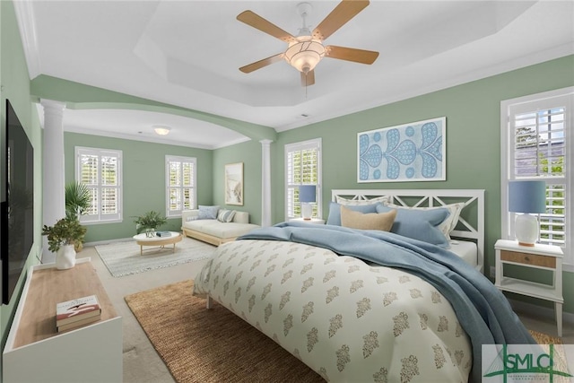 105 Crooked Wood Ln, Savannah, GA 31406 - bedroom featuring decorative columns, a raised ceiling, multiple windows, ornamental molding, and ceiling fan