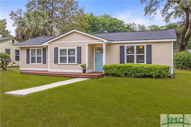 108 Gilliam Ave, Savannah, GA 31406 - view of front facade with a front yard and a shingled roof