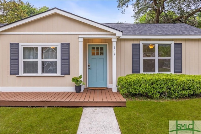108 Gilliam Ave, Savannah, GA 31406 - view of front of property with a front lawn and a shingled roof