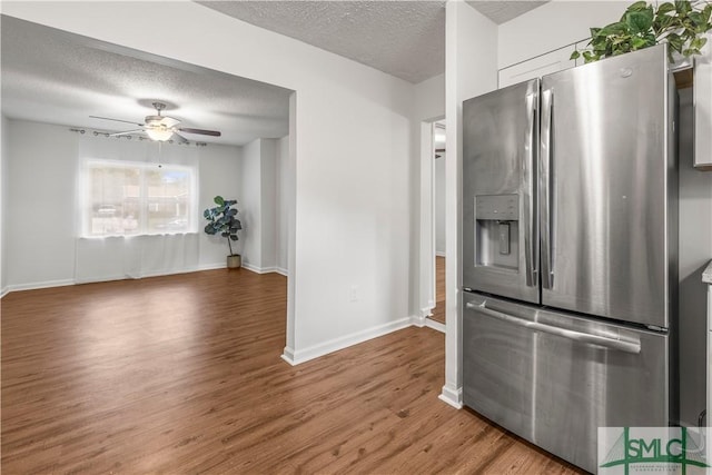 108 Gilliam Ave, Savannah, GA 31406 - kitchen with stainless steel refrigerator with ice dispenser, a textured ceiling, wood finished floors, ceiling fan, and baseboards