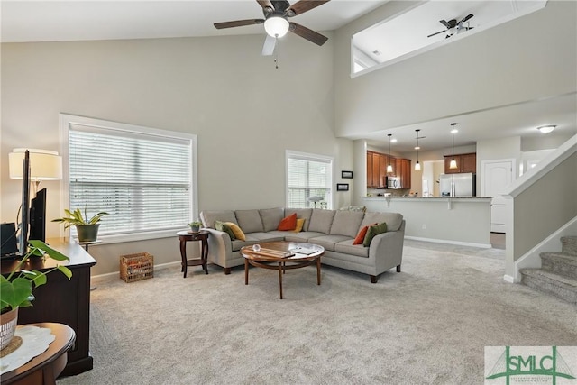 17 Olde Gate Ct, Pooler, GA 31322 - living area featuring light carpet, ceiling fan, plenty of natural light, baseboards, and a towering ceiling