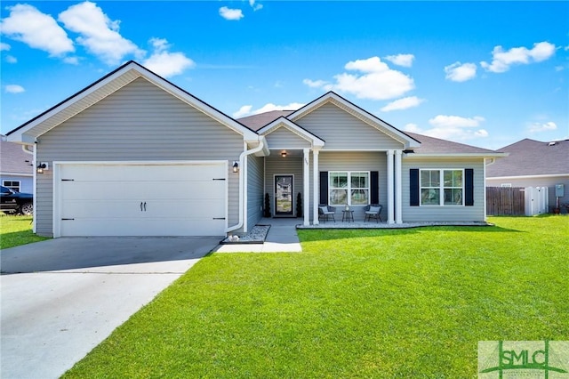 single story home with a garage, driveway, and covered porch