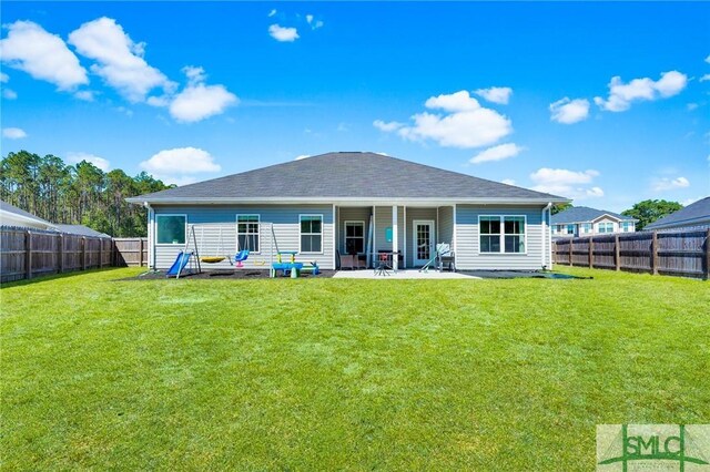 back of property featuring a patio